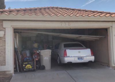 Chandler garage door falling cause of rollers worn